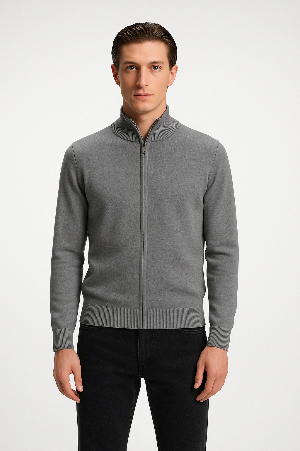 Man wearing a gray zip-up sweater on a white background