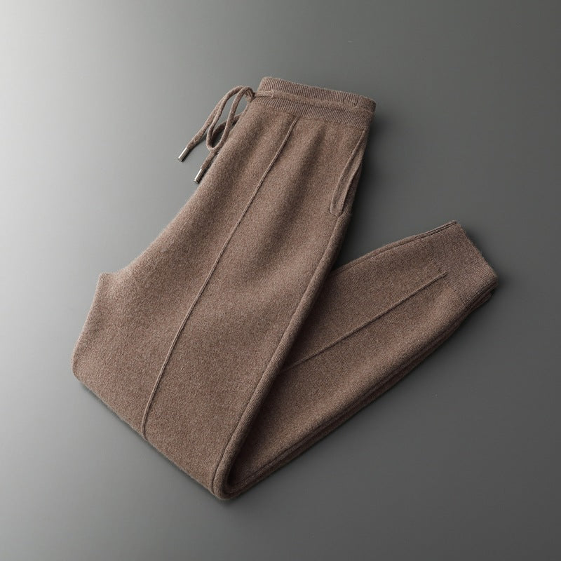 Brown sweatpants on a gray background