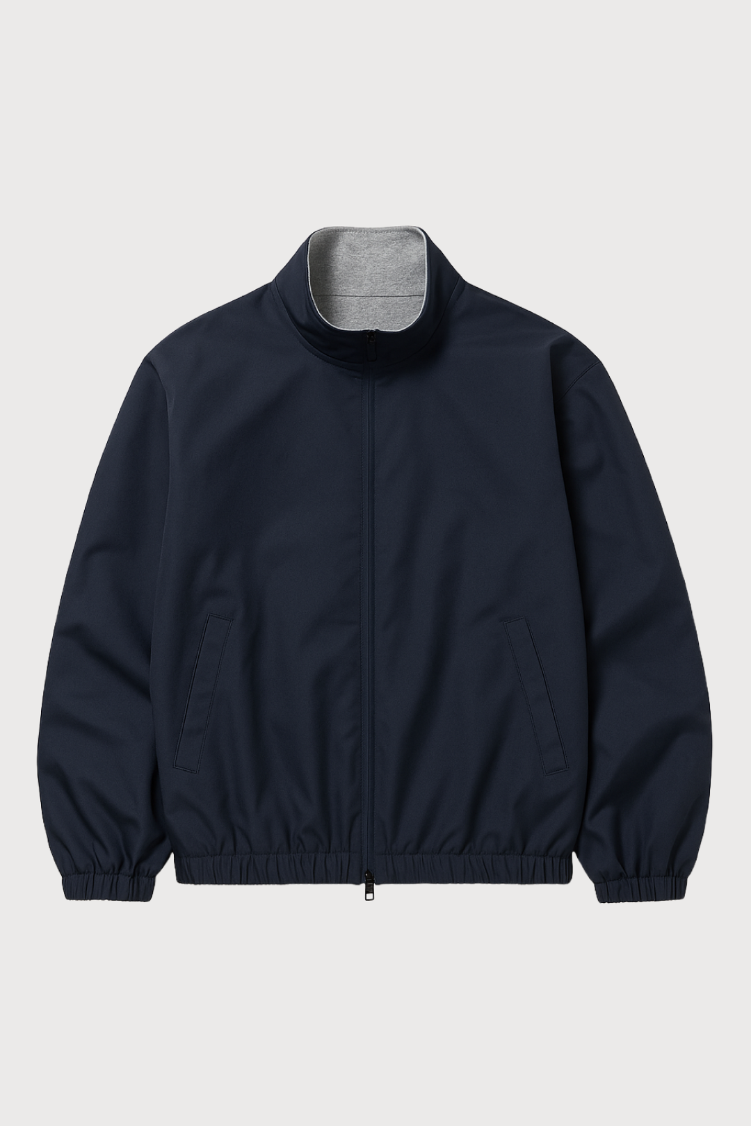 Navy blue jacket with gray collar on a light beige background