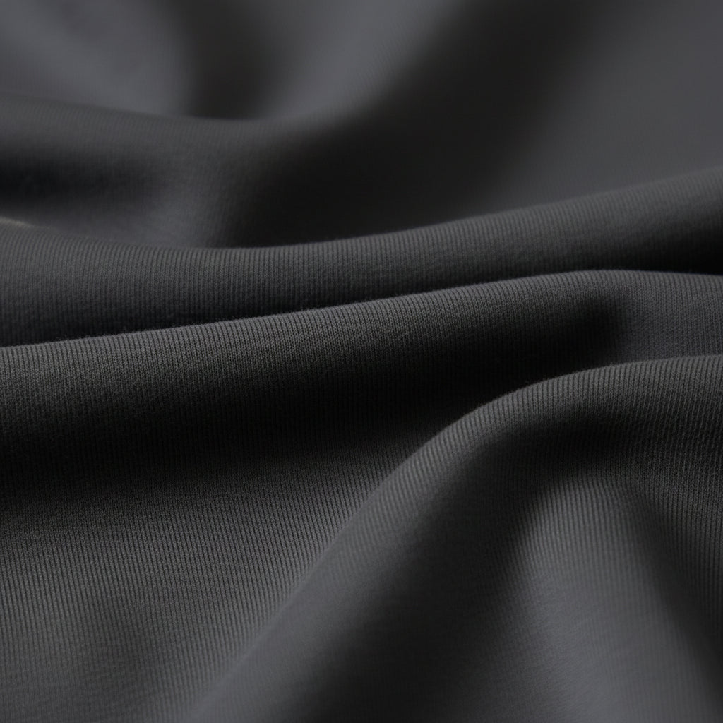 Close-up of dark charcoal gray fabric with soft folds and Chinese text overlays highlighting warmth, softness, and thickness, plus '400G' and fabric description at the bottom.