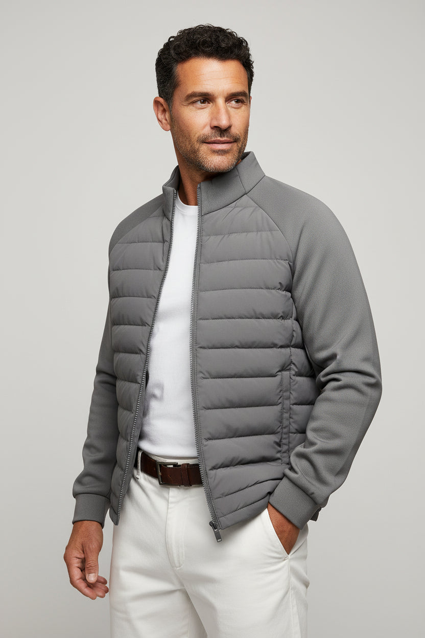 Gray puffer jacket on a white background