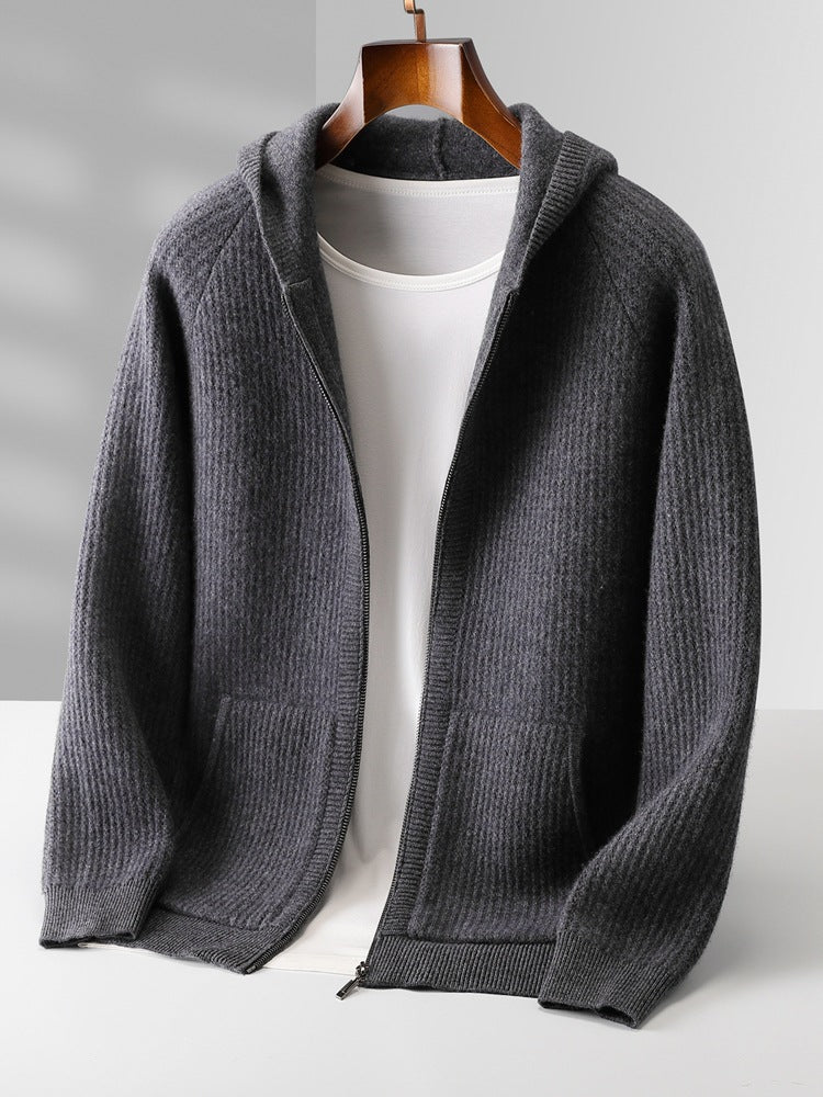 Gray zip-up sweater on a mannequin against a gray background